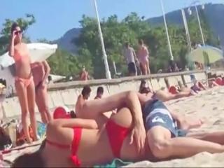 Sneaky fuck on the beach